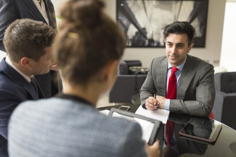Businessman and woman talking