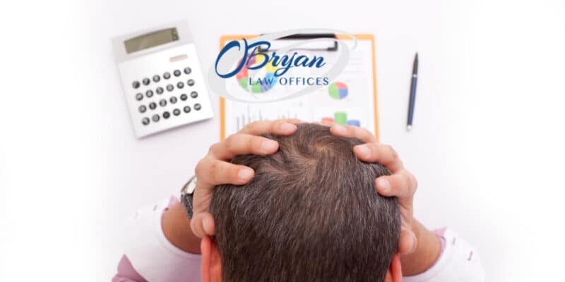 Man Stressing over Debt and bankruptcy