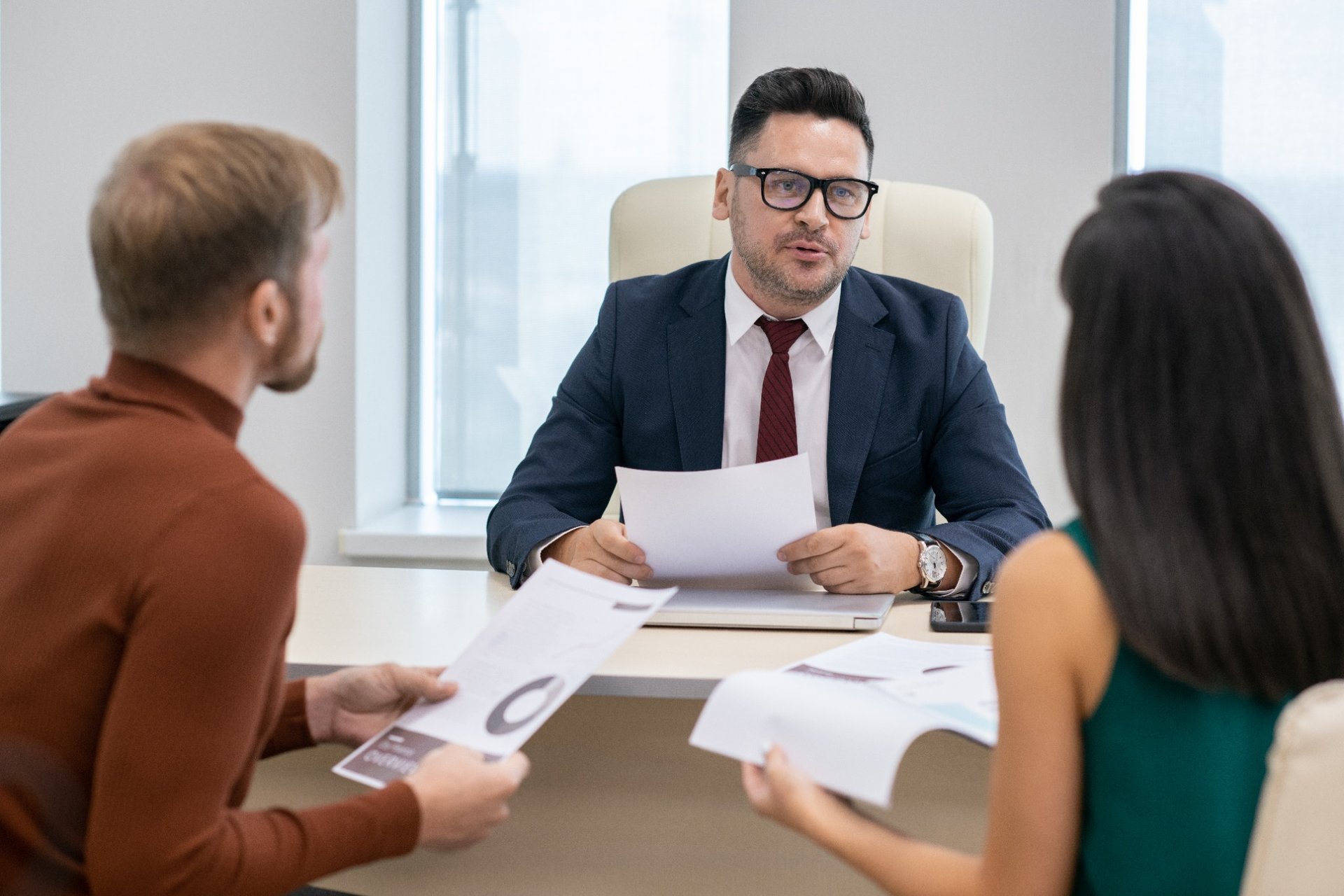 Attorney explaining financial options to clients