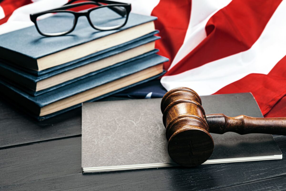 judge-gavel-on-the-background-of-the-flag