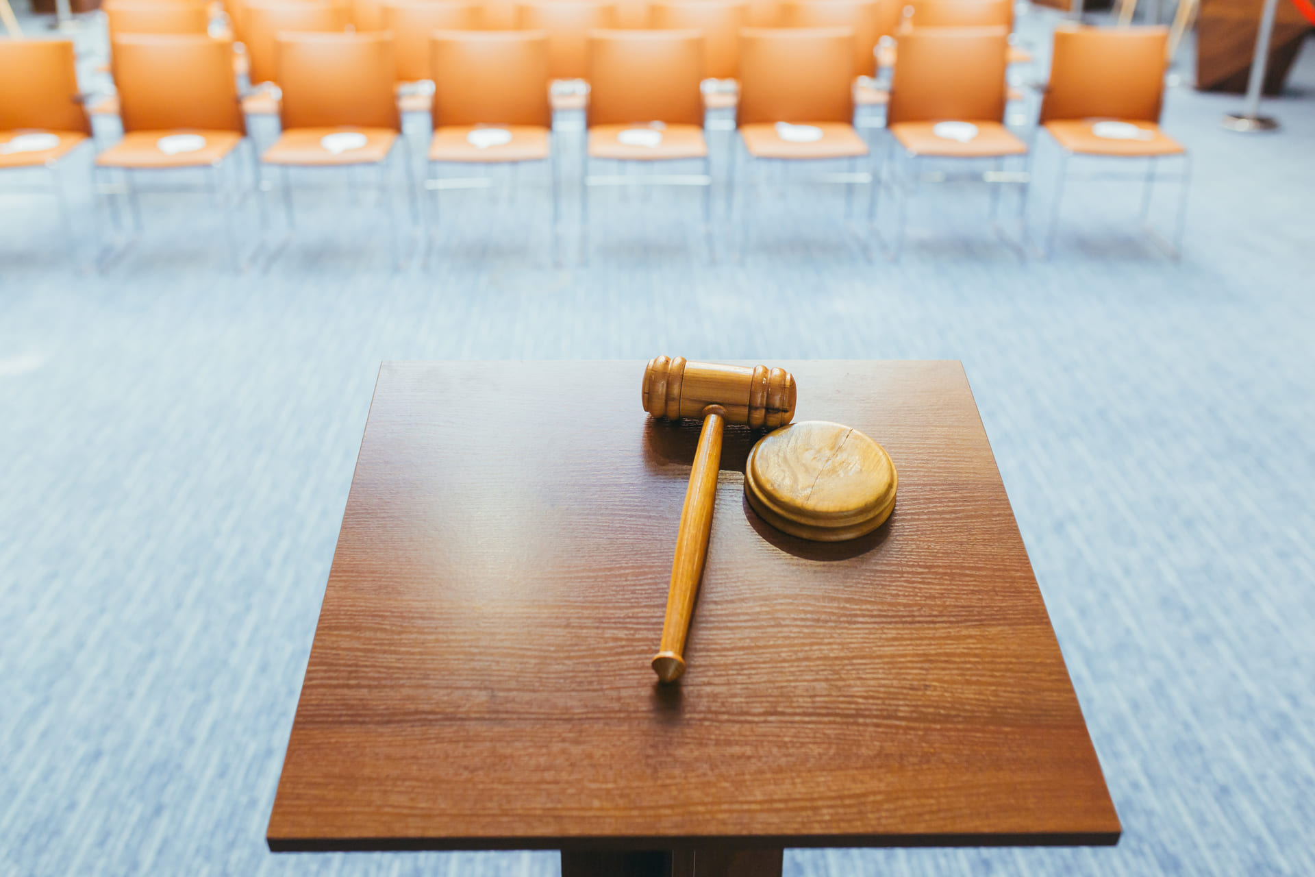 big wooden court hammer on table