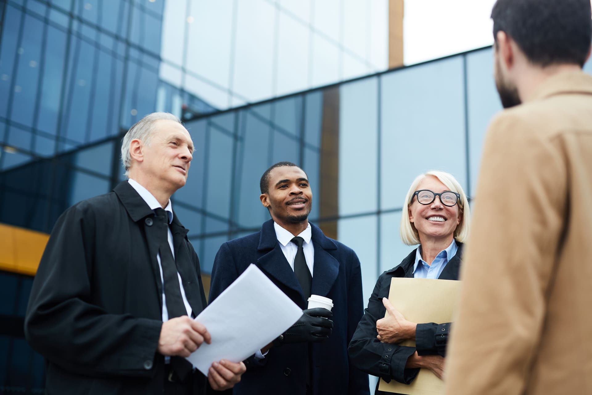 lawyers speaking with client