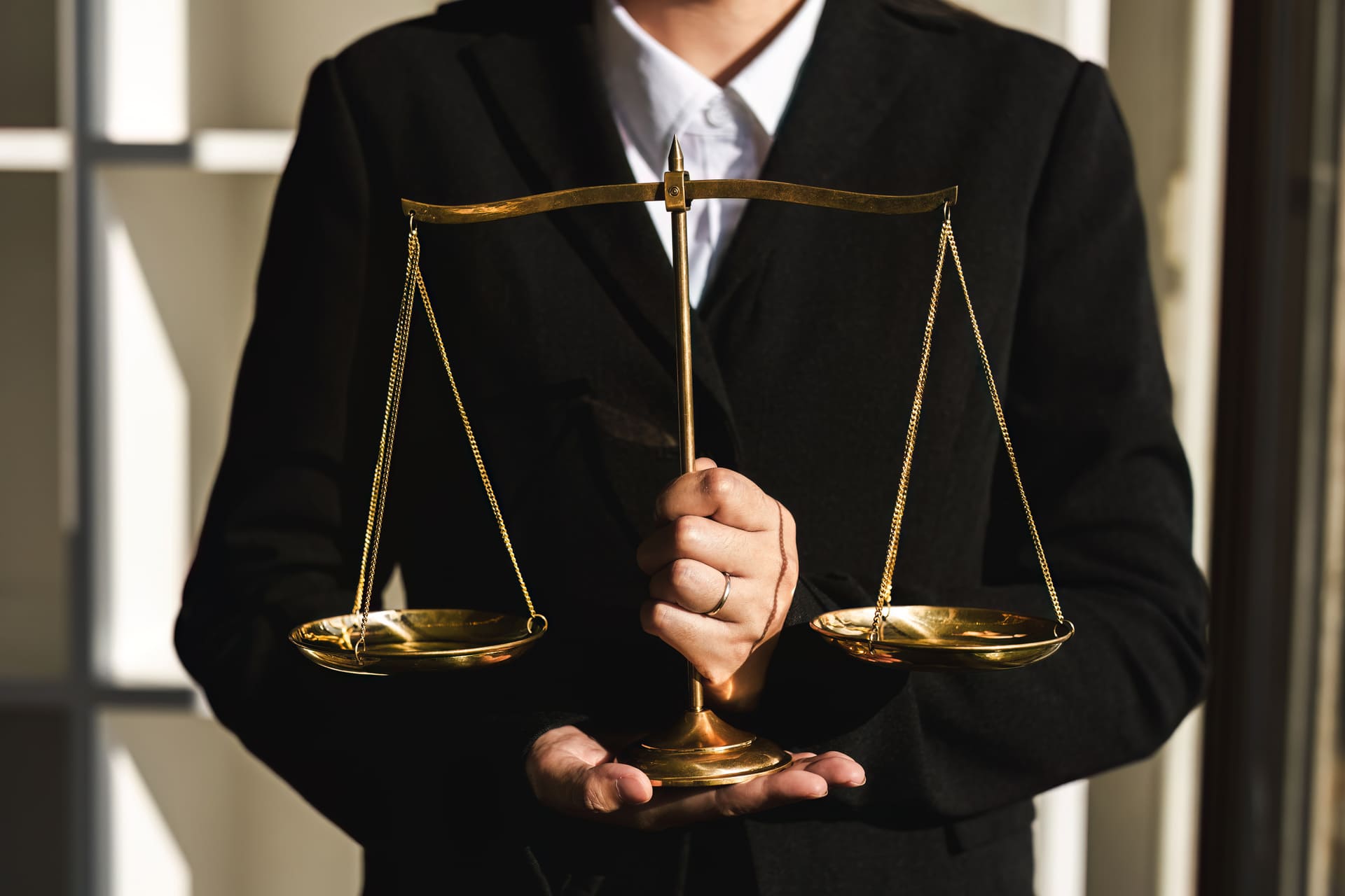 concept of justice with lawyer holding scales