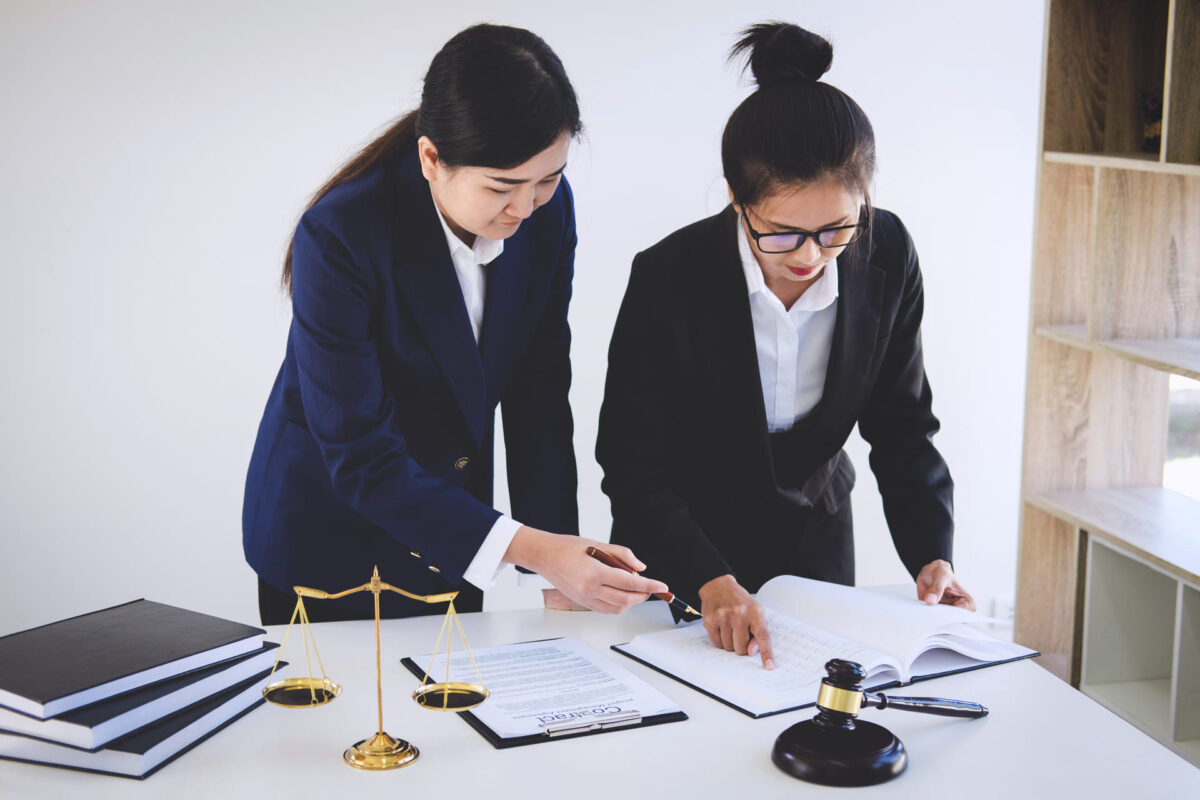 Lawyers reviewing bankruptcy files
