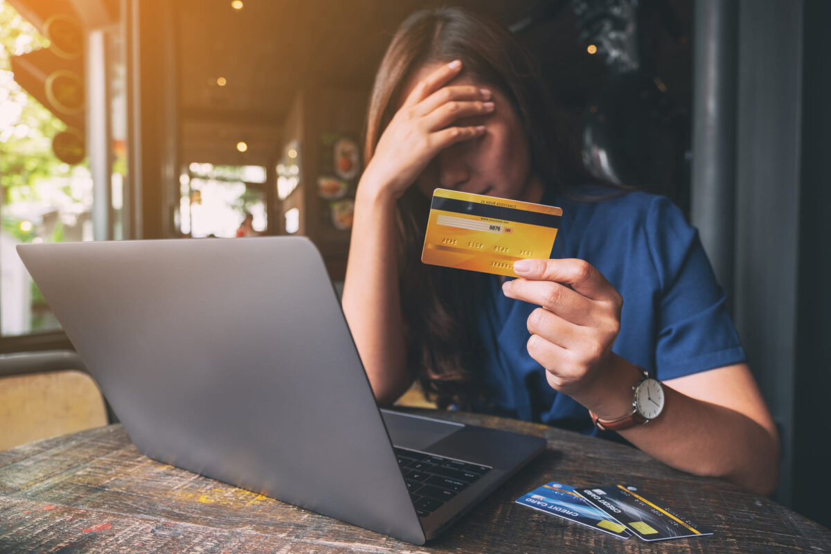 woman upset about credit card score