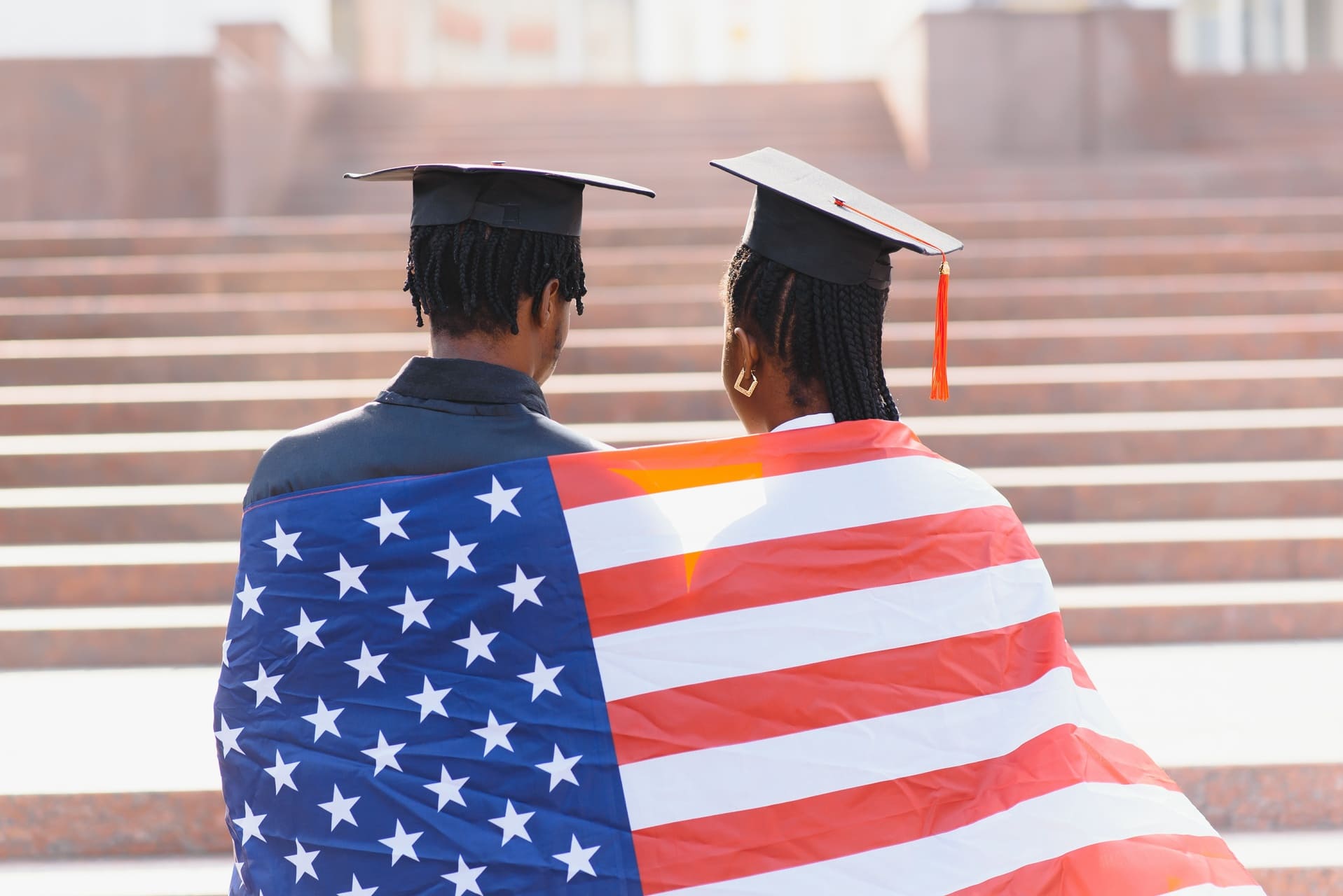 students covered in the american flag