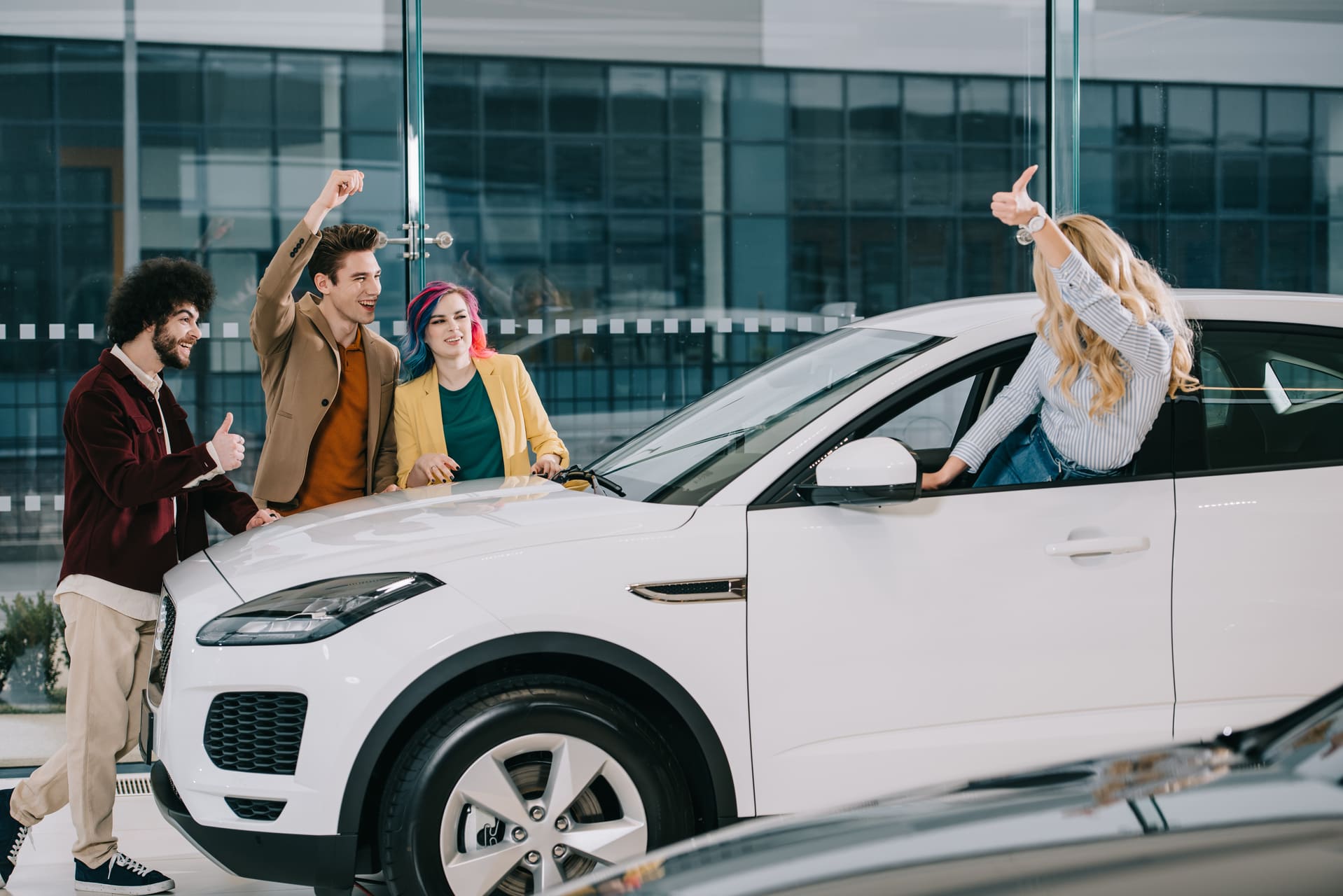 car owner showing off new car