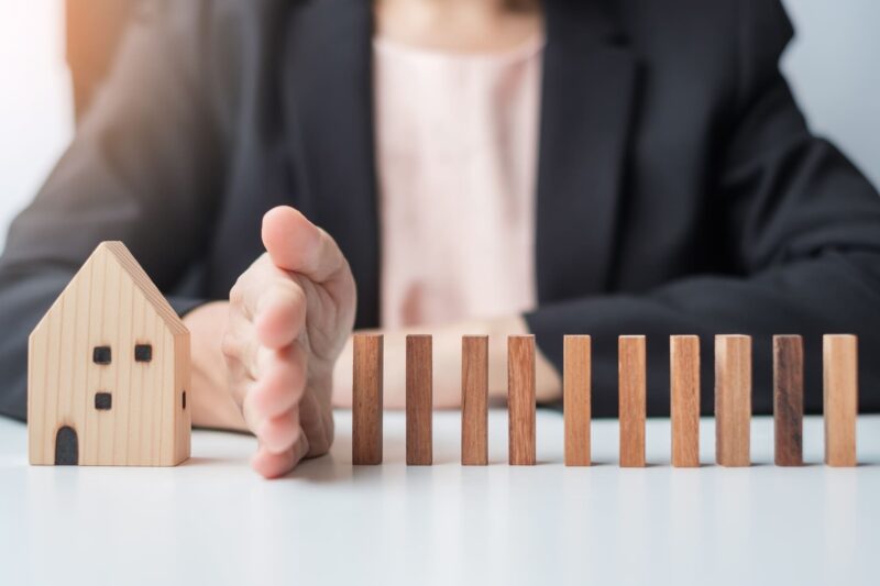 Lawyer stops dominos from falling on home