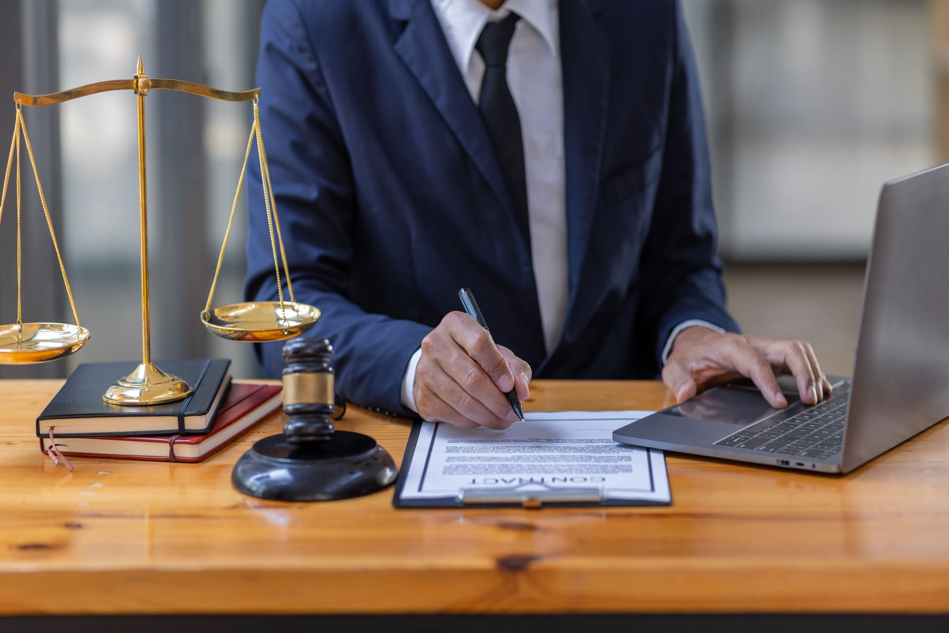 lawyer signing documents