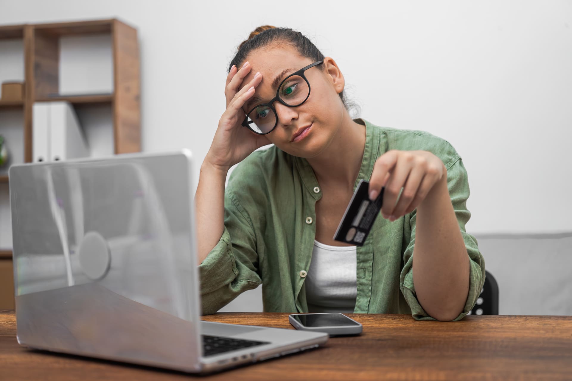 woman stressed about debt