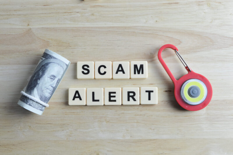 top-view of scam alert illustration
