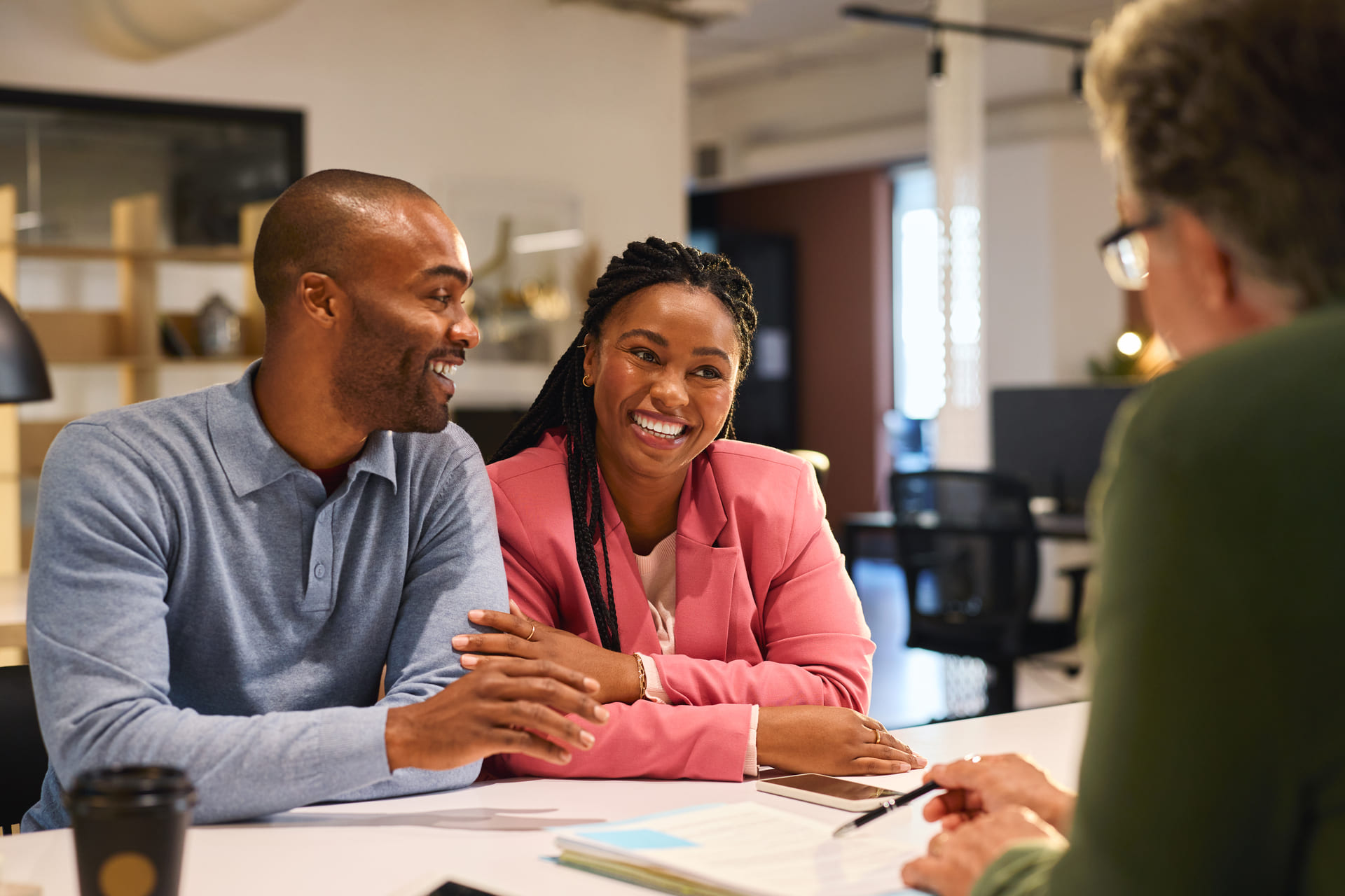 couple-meeting-with-financial-advisor-in-office