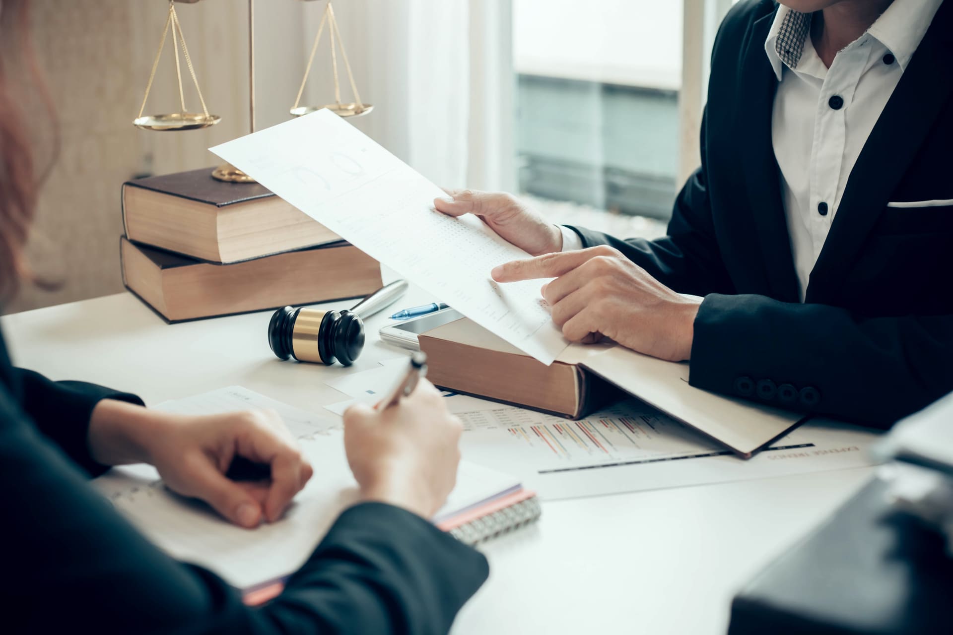 legal-professionals-reviewing-documents-in-office