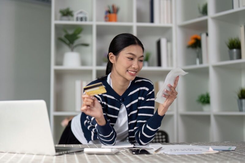 woman checking her credit card bills