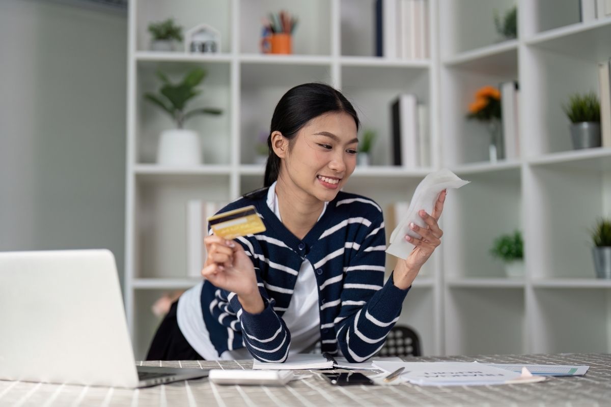 woman checking her credit card bills
